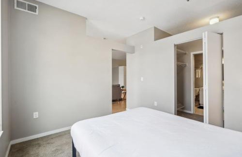 Mill District Apartment | CozySuites Mill District with pool, gym #01