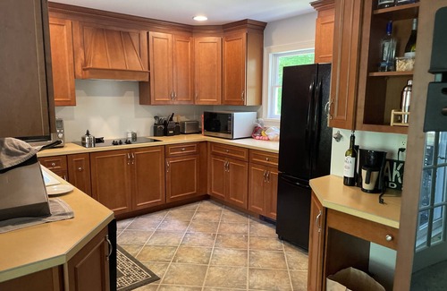 Montoursville House | Creekfront getaway with hot tub and fire pit.
