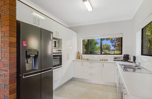 Currumbin Waters House | Currumbin Breeze - Classic Family Beach House on Currumbin Creek - Pet Friendly!