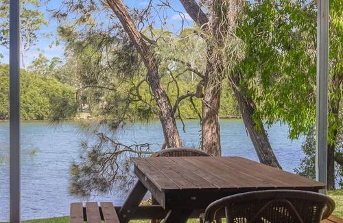 Currumbin Waters House | Currumbin Breeze - Classic Family Beach House on Currumbin Creek - Pet Friendly!
