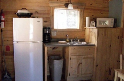 Rapid City Cabin | Custom Built Log Cabin Bordered by Black Hills National Forest