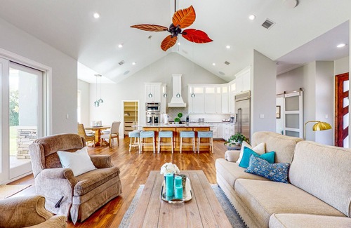Waller House | Custom home with guesthouse, pond, sunning deck, beach & tropical bar