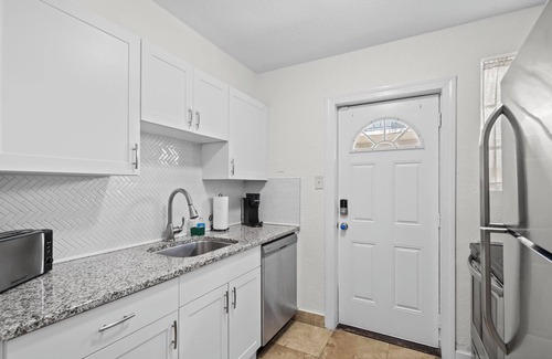 Harbour Island Apartment | "Davis Islands Charm! Euro Oasis Walkable to Events, Eats & Care!"