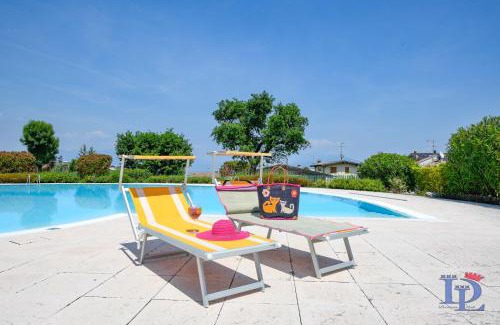 Rivoltella Apartment | DesenzanoLoft Official Partner MARRIOTT Homes & Villas -Butterfly and 5 Pools Family Apartment