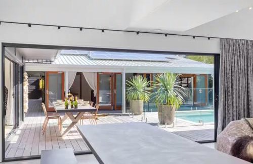 Marcus Beach House | Desert Flame Oasis with Sparkling Pool