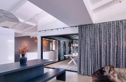 Marcus Beach House | Desert Flame Oasis with Sparkling Pool
