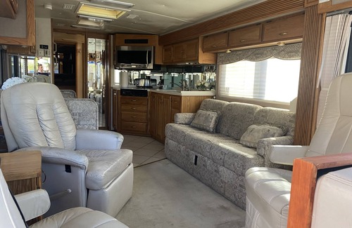 St. George House | Desert Hideaway RV Inn *Pets Welcome{no fee}* Stone pool w/relaxing Waterfall
