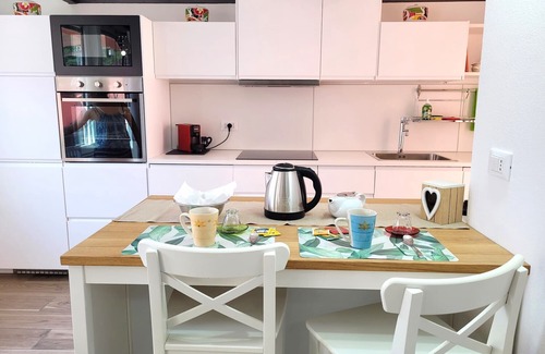 Pisogne Apartment | Design apartment with sun terrace and a 5-minute walk from the lake