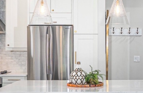 Kelowna Central Business District Hotel | Designer Penthouse in the heart of Downtown Kelowna