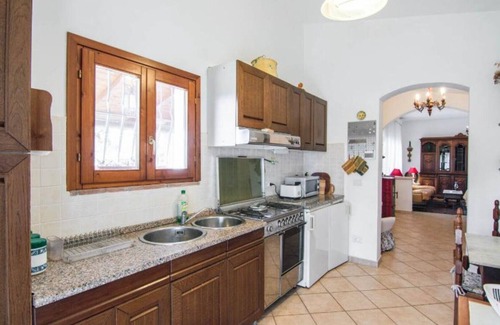 Fauglia Ski Chalet | Detached cottage in a park-like garden overlooking the pool