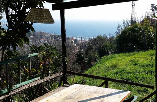 Sanremo House | Detached cottage surrounded by greenery-independent cottage into the garden.
