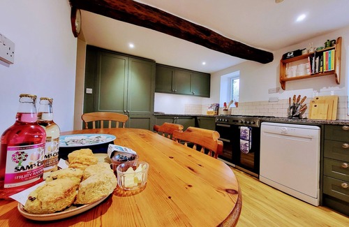 High Bickington Cottage | Devon Hideaway: Historic Barn, Jacuzzi & Expansive Exmoor Views