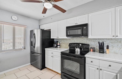 Cocoa Beach Condo | Direct Ocean Front Condo Steps to the Beach with Heated pool, Hot tub and Tennis Court!