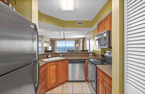 Seawinds Condo Condo | Direct oceanfront corner condo with stunning views, huge balcony, heated pool, and garage parking