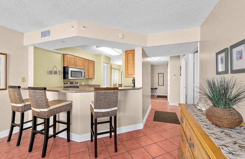 Seawinds Condo Condo | Direct oceanfront corner condo with stunning views, huge balcony, heated pool, and garage parking