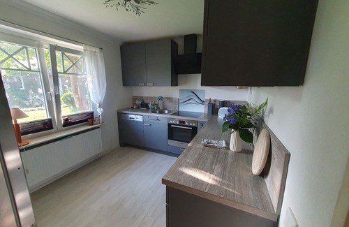 Almdorf House | "Discover Ultimate Relaxation at Ferienhaus Friesenbude Safe Haven!"