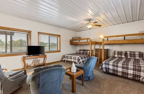 Burt County Cabin | Discover your perfect riverfront escape in Decatur, Nebraska!