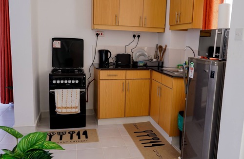 Riruta Apartment | Divine Stays w/WIFI, Netflix, Swimming Pool, Gym, Parking, Lift