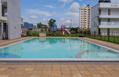 Riruta Apartment | Divine Stays w/WIFI, Netflix, Swimming Pool, Gym, Parking, Lift
