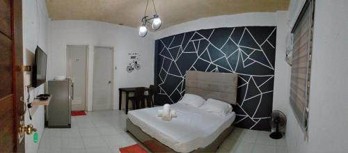 Cabanatuan Apartment | DJCI Apartelle Walk to Robinson & NE Pacific Mall 3 Min to SM Cabanatuan