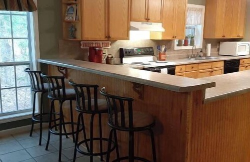 Hawkins House | Dock Holiday is a lakefront home with hot tub. Bring your fishing pole.