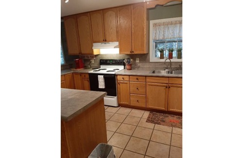 Hawkins House | Dock Holiday is a lakefront home with hot tub. Bring your fishing pole.
