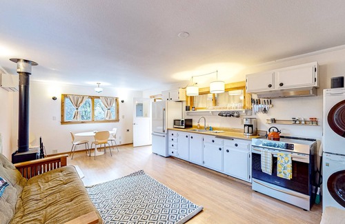 Cleone House | Dog-friendly, eco-conscious home with great yard & EV charger, near the beach