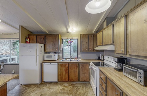 Coos Bay House | Dog-friendly home near the beach with entertainment & 2-acre fenced yard