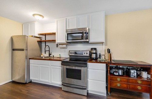 Clinton House | Dog-friendly home with a yard, washer/dryer, partial AC - near attractions