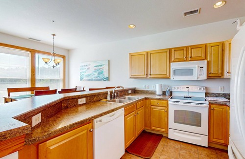 Bermuda Bay House | Dog-friendly water-view home with pool, balcony - beach access is 1.5 miles away