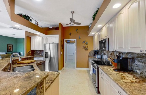 Matlacha Isles House | Dog-friendly waterfront home with heated pool, lanai, central AC, & W/D