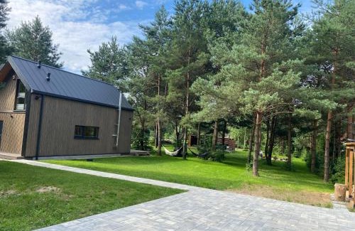 Pasym House | Dom na brzegu ciszy