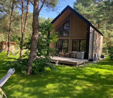 Pasym House | Dom na brzegu ciszy