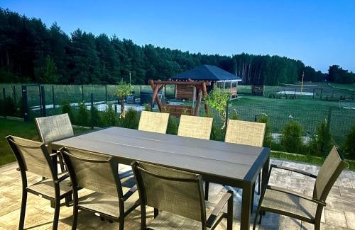 Checiny Cabin | Domek pod lasem