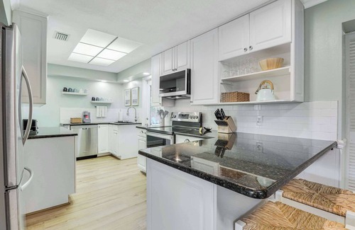 Stuart House | Downtown Beach Cottage - Heated Pool