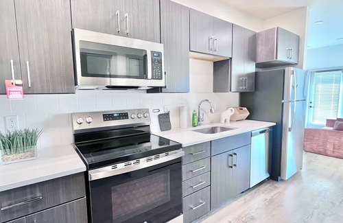 Fall Creek Place Apartment | Downtown Highrise 1BD Theater with Free parking & WIFI