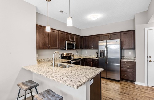 Downtown Des Moines House | Downtown Skyline Views in Modern Townhome with Rooftop Patios