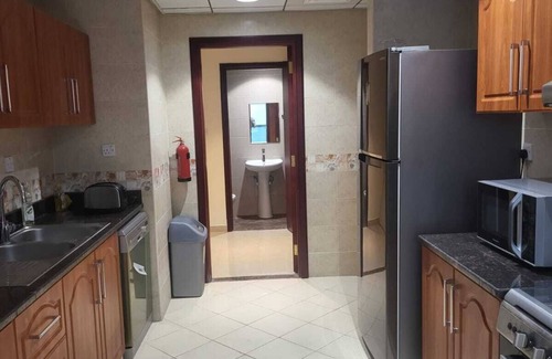 Rumailah Apartment | Duplex Spacious 4-bedroom sunset sea views apartment with swimming pool.