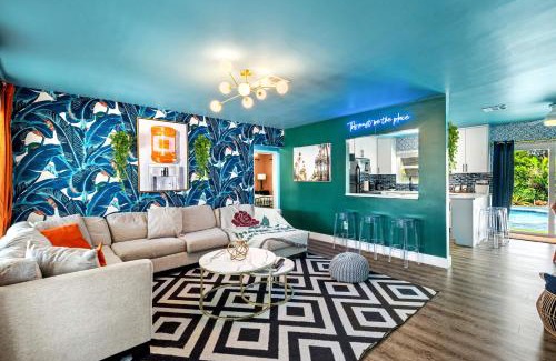 Garden Isles House | Eccentric home with pool tiki hut & outdoor kitchen