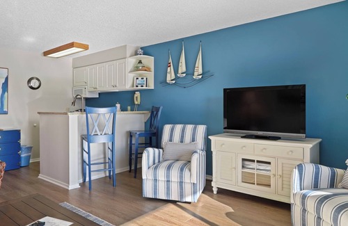 Charlevoix Condo | Edgewater Inn Condo #117D with Waterfront Access | Pool, Hot Tub, Sauna