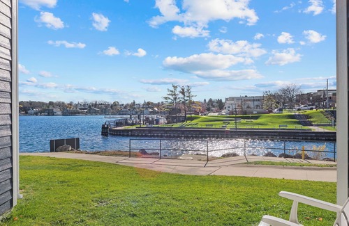 Charlevoix Condo | Edgewater Inn Condo #117D with Waterfront Access | Pool, Hot Tub, Sauna