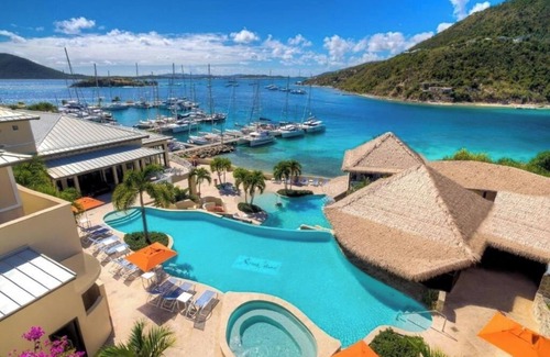 Scrub Island Apartment | Elegant Room with Balcony Ideal for Peaceful Beachside Island Escapes