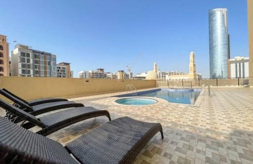 Jadaf Apartment | Elegant Studio with Canal View and Close to Metro