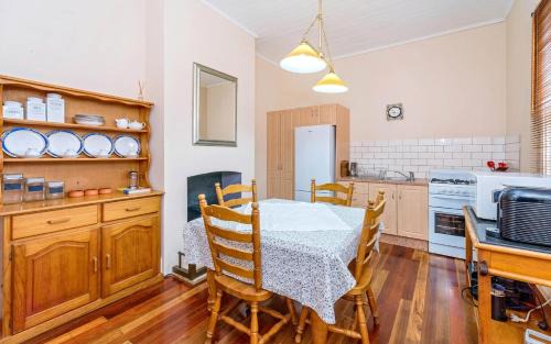 Grafton Apartment | Eliza 1875 Red Brick Duplex Townhouse