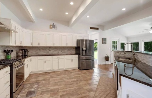 Collierville House | Enchanted Manor: A Luxurious Tudor-Style Retreat Amidst Nature's Splendor
