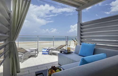 East Daytona Hotel | Enjoy a Hassle-free Stay! Beachfront Property w/Pool, Pets Allowed, Parking!