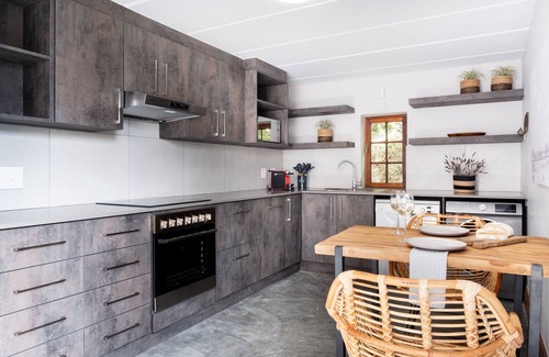 Stellenbosch Apartment | Enjoy the privacy of your own wood fired hot tub, braai and breathtaking views.