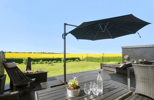 Korsor House | Enjoy the tranquillity of nature in this vacation home, nestled in an idyllic landscape.