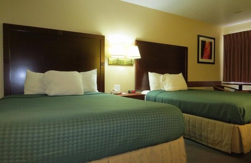 St. George Hotel | Enjoy Two Relaxing Rooms in St. George, Perfect for Families | Free Parking