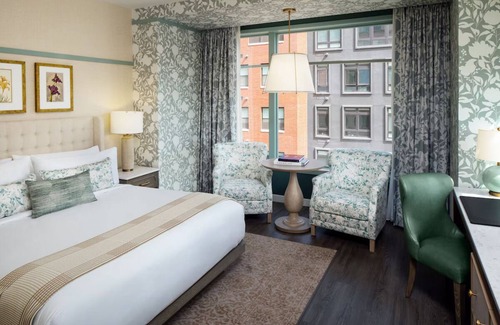 Fitzsimons Hotel | Enjoy Ultimate Comfort w/Kitchenettes, Room Service - Nearby Aurora Wonders!